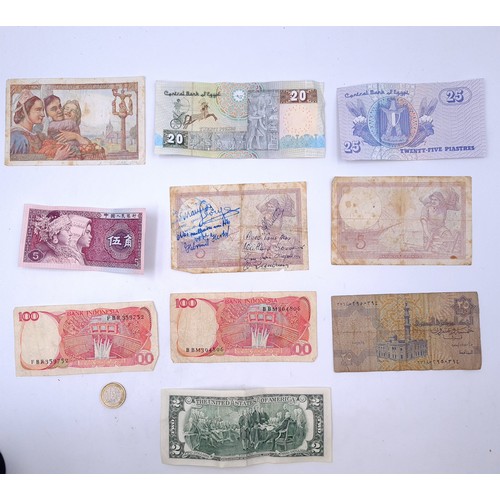 56 - A collection of ten international bank notes. One rare USA $2 note, three French, three Egyptian, tw... 