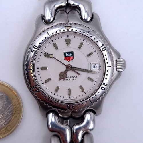 60 - Star Lot : A Genuine Tag Heuer Professional wrist watch. Watch No. WG1212-KO. Set with baton dial, s... 