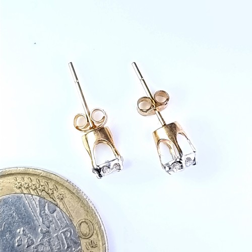 8 - Star Lot : A very pretty pair of bright cut diamond stud earrings set in 9 carat gold. Diamond diame... 