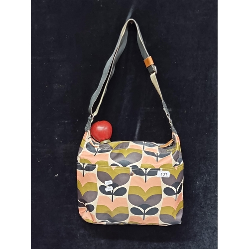 131 - A genuine Orla Kiely shoulder bag in shades of pink, olive, brown and cream in her signature design.... 