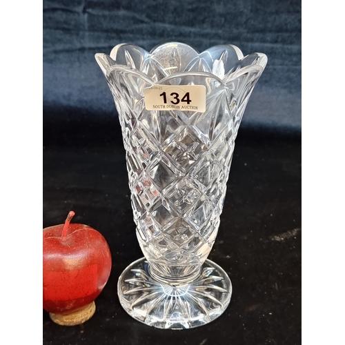 134 - A Waterford Crystal footed vase. With acid mark and in very good condition.