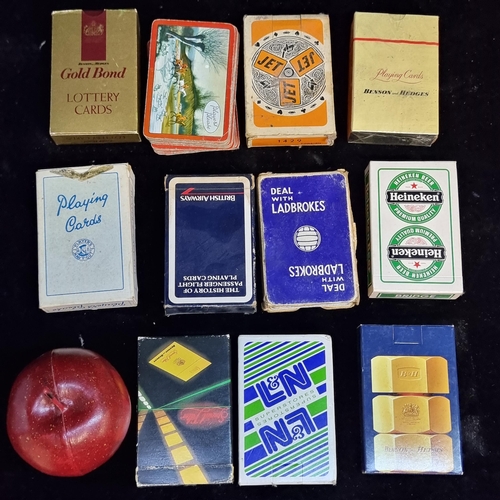 138 - Ten vintage playing cards decks from brands Player's, Benson and Hedges and British Airways.