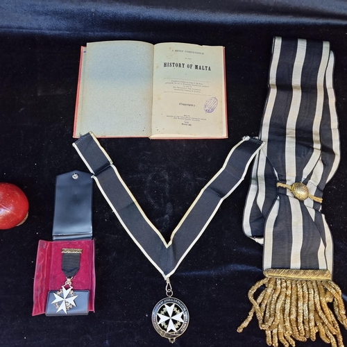 204 - Four items of Maltese historical interest including two Knights of Malta service medals with one ste... 