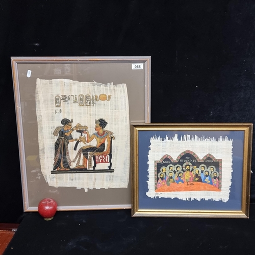 68 - A pair of original ink on papyrus paper paintings, one featuring a Coptic style religious scene of t... 