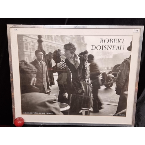 118 - A very large print of a photograph originally by the photographer Robert Doisneau titled 