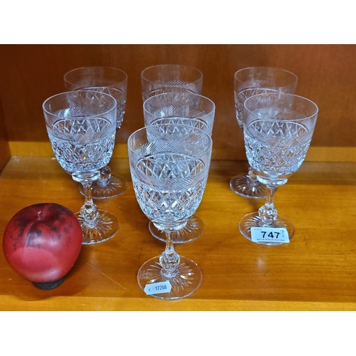 747 - A fabulous set of seven Tudor Crystal stemmed drinking glasses. All in great condition.