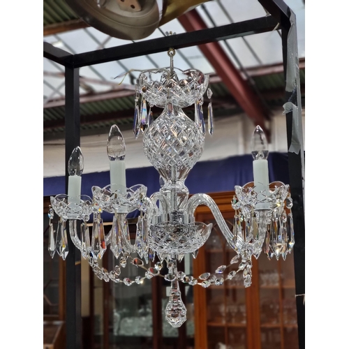 759 - Star Lot: A gorgeous Waterford Crystal chandelier with five branches, droplets and garlands. Fully  ... 