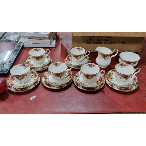 803 - Twenty pieces of Royal Albert china in the Old Country Rose pattern. Comprising of a creamer, bowls,... 