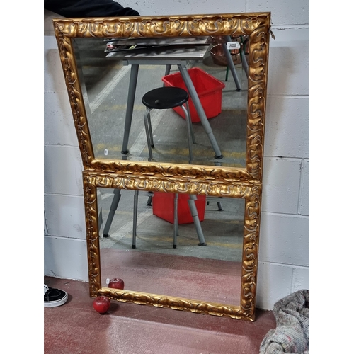 808 - A pair of lavish bevelled mirrors held in striking carved gilded frames. H75cm x W65cm Lovely qualit... 