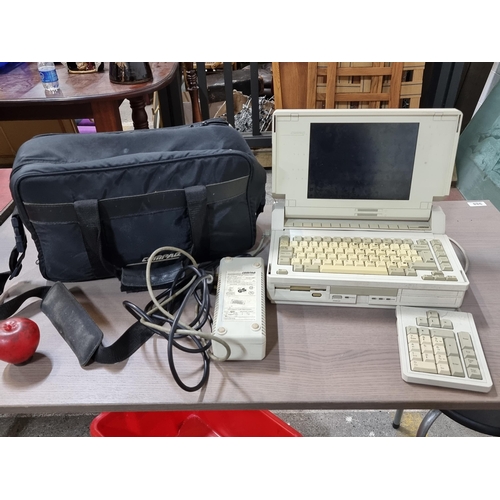 809 - Star Lot: Four vintage Compaq computer items including SLT386s/20 portable computer comprising of a ... 