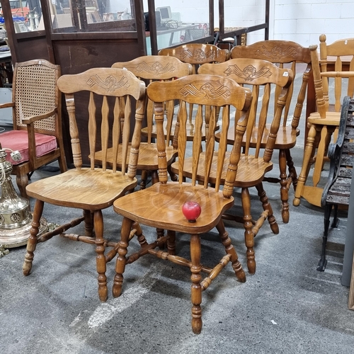 817 - A set of six charming dining chairs with slatbacks featuring a floral carving to top and turned supp... 