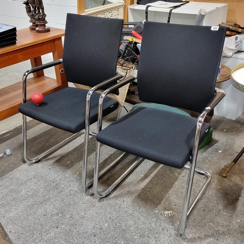 826 - Star Lot : A pair of designer Girsberger Diagon cantilever office chairs with padded seats, net back... 