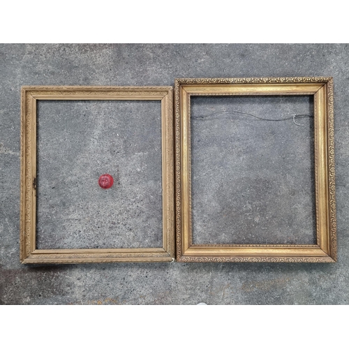 944 - Two large vintage gilded wooden frames. H91cm x W77cm and H89cm x W76cm.