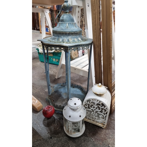 955 - Three ornate lanterns including a large example in a turquoise finish.