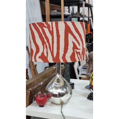 958 - A gorgeous solid chrome table lamp with two tone shade and three pin plug.