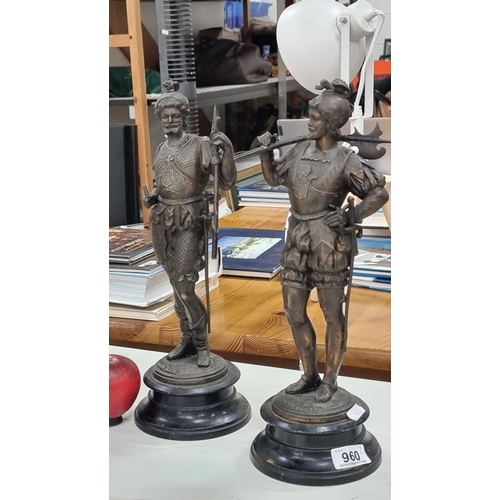 960 - Star lot :  A wonderful pair of 19th century heavy vintage copper guardsman figures, each holding we... 