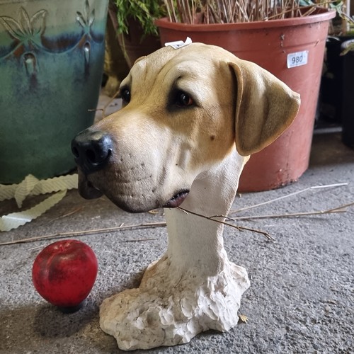 842 - A charming heavy stone garden figure of a dogs head.