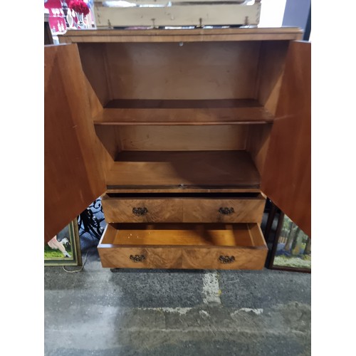 718 - A magnificent Victorian walnut double fronted cabinet with brass dropleaf handles and two additional... 