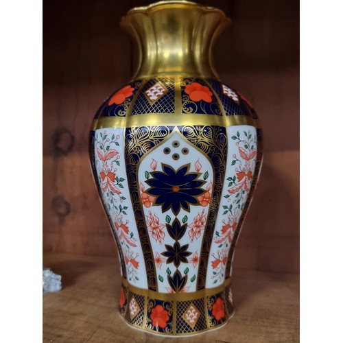 835 - Star Lot: A gorgeous Royal Crown Derby 'Old Imari' 1128 vase boasting a striking gilded motif and fl... 