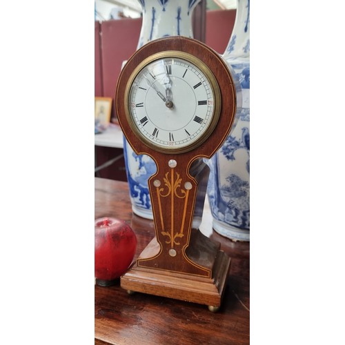 987 - A beautiful tall vintage mantle clock housed in an ornate wooden case featuring mother of pearl and ... 