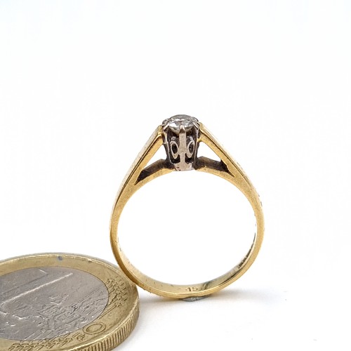 6 - Star Lot : A elegant example of a vintage  bright Diamond solitaire 18 carat gold ring, set with a w... 