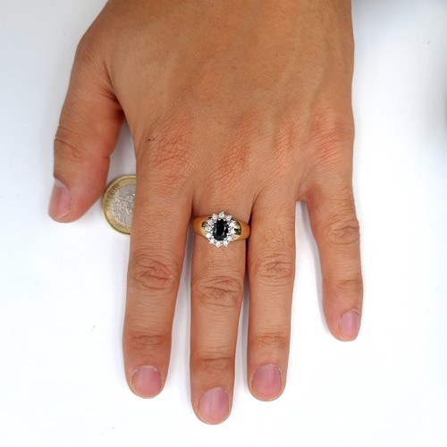 8 - Star Lot : A show stopping vintage heavy gauge Diamond and Sapphire 14 carat gold ring, set with a w... 