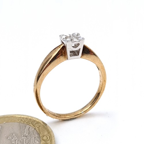 7 - Star Lot : An unusual square set Diamond 9 carat gold ring, featuring a brilliant sun burst halo sur... 