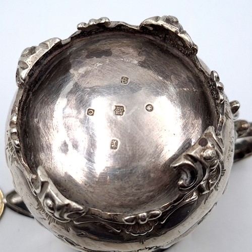 47 - A profusely detailed Victorian Repousse relief sterling silver creamer, featuring beautiful floral a... 