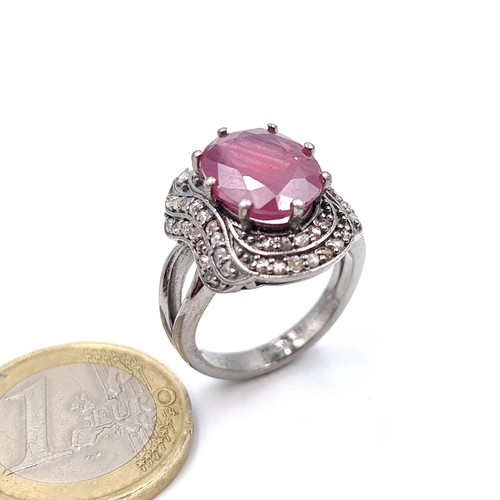 58 - Star Lot : A certified 12.3 carat natural Diamond and Ruby stone ring, mounted in sterling silver an... 