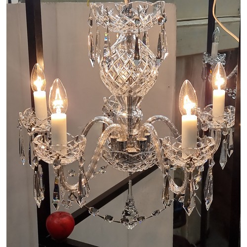 759 - Star Lot: A gorgeous Waterford Crystal chandelier with five branches, droplets and garlands. Fully  ... 