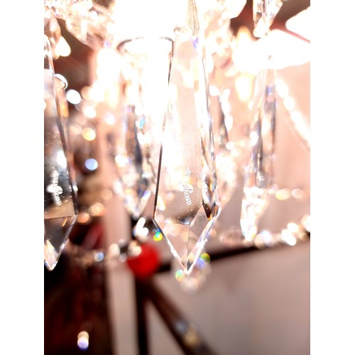 759 - Star Lot: A gorgeous Waterford Crystal chandelier with five branches, droplets and garlands. Fully  ... 