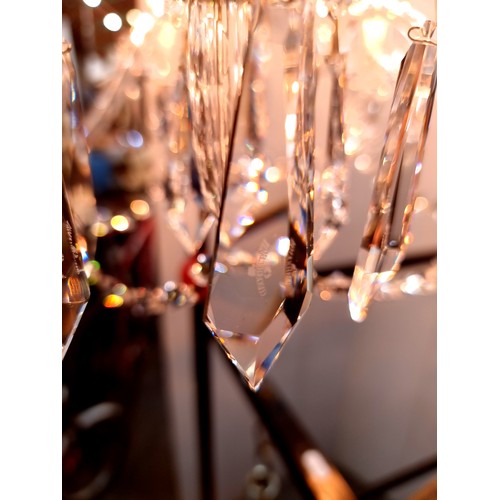 759 - Star Lot: A gorgeous Waterford Crystal chandelier with five branches, droplets and garlands. Fully  ... 