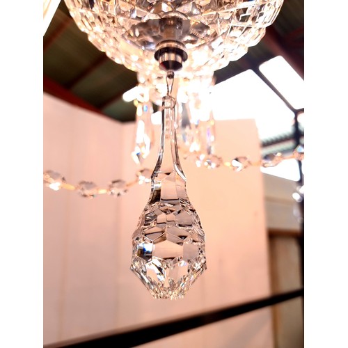 759 - Star Lot: A gorgeous Waterford Crystal chandelier with five branches, droplets and garlands. Fully  ... 