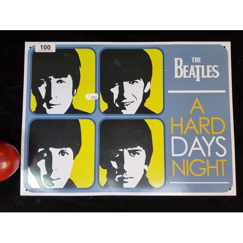 100 - A metal sign featuring The Beatles band members from the cover of their 'A Hard Days Night' album co... 