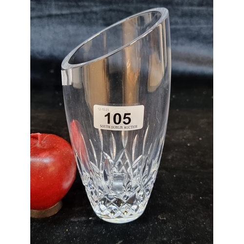 105 - An elegant Waterford Crystal Lismore Essence Angled Round vase. A very small chip to the base. With ... 