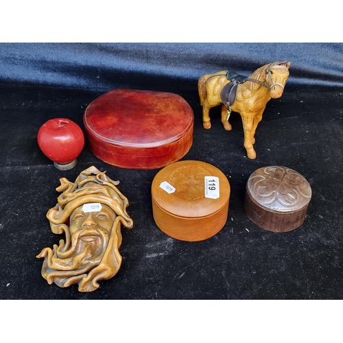 119 - Five leather items including a figure of a horse, a mask and 3 leather jewellery boxes.