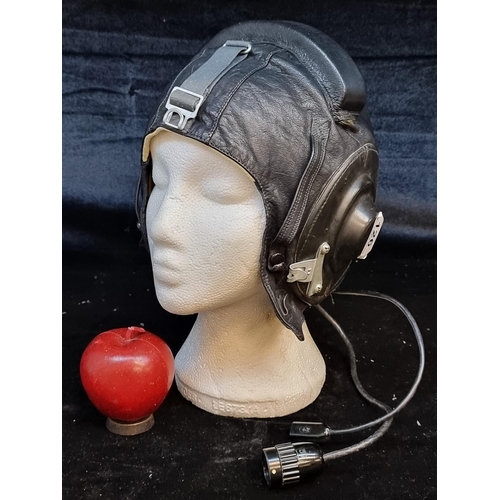 126 - A vintage Soviet leather military aviator helmet c. 1980s. With built-in ear muffs, a padded head pr... 