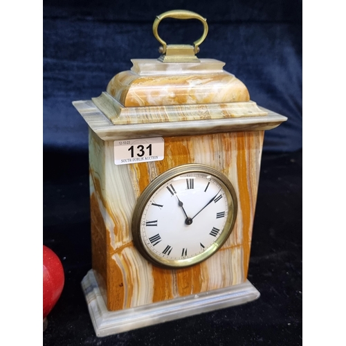 131 - A handsome Art Deco Swiss made onyx mantle clock from Buren. Features a beautiful multi-coloured cas... 