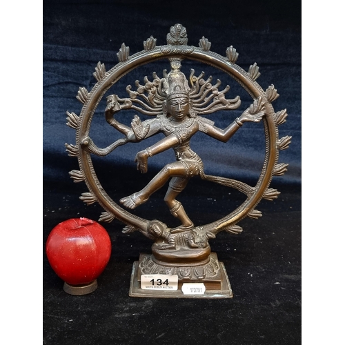 134 - Star Lot: A beautiful antique bronze sculpture depicting the Hindu deity Shiva Nataraja. Features gr... 