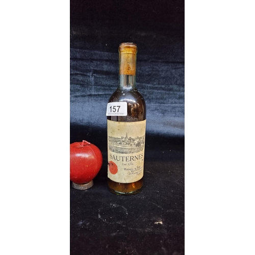 157 - A vintage bottle of Sauternes Premier Cru wine bottled by Mitchell & Son Wine Merchants Ltd. on 21 K... 