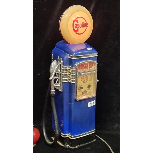 180 - A wonderful tall vintage style radio in the form of an American gasoline pump. H55cm. It lights up a... 