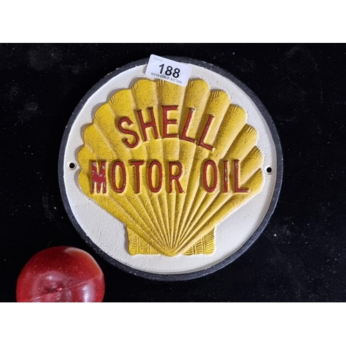 188 - A heavy circular cast metal wall sign advertising Shell Motor Oil.