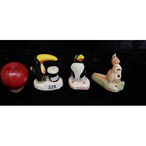 228 - A collection of three Carlton Ware Guinness zoo keeper figures including, penguin, toucan and kangar... 