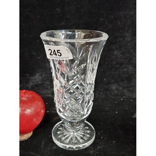 245 - A beautiful Waterford Crystal pedestal vase in excellent with acid mark to base.