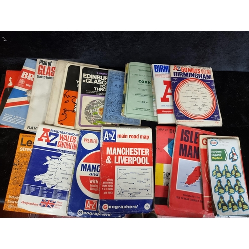 246 - A large collection of approximately twenty vintage maps including Africa, Dublin and Leeds.