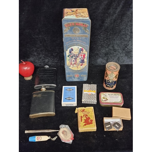 254 - A tin full of collectable items including a propelling pencil by Miag, two hip flasks and a beautifu... 