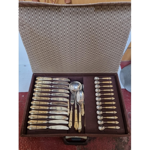 268 - A super complete vintage cutlery canteen with 12 sets of knives, forks, spoons and tea spoons with l... 