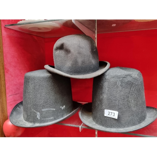 273 - Three felt hats including a bowler example along with two top hats.