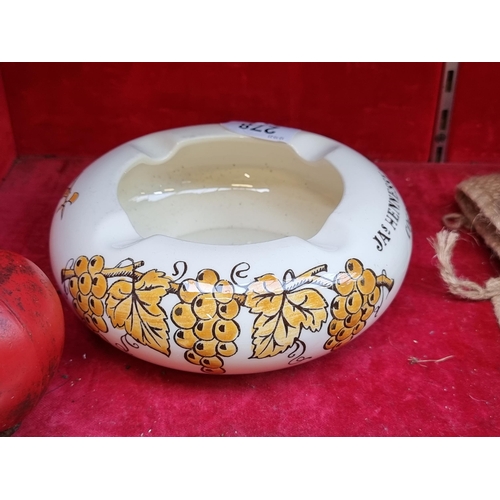 278 - A beautiful rare vintage ceramic ashtray by James Hennessy & Co Cognac, featuring vine and grape mot... 