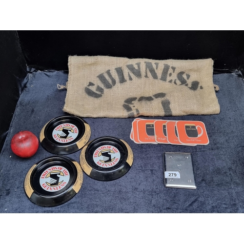 279 - A cigarette case featuring harp and shamrock motif to front, along with ten vintage Guinness branded... 